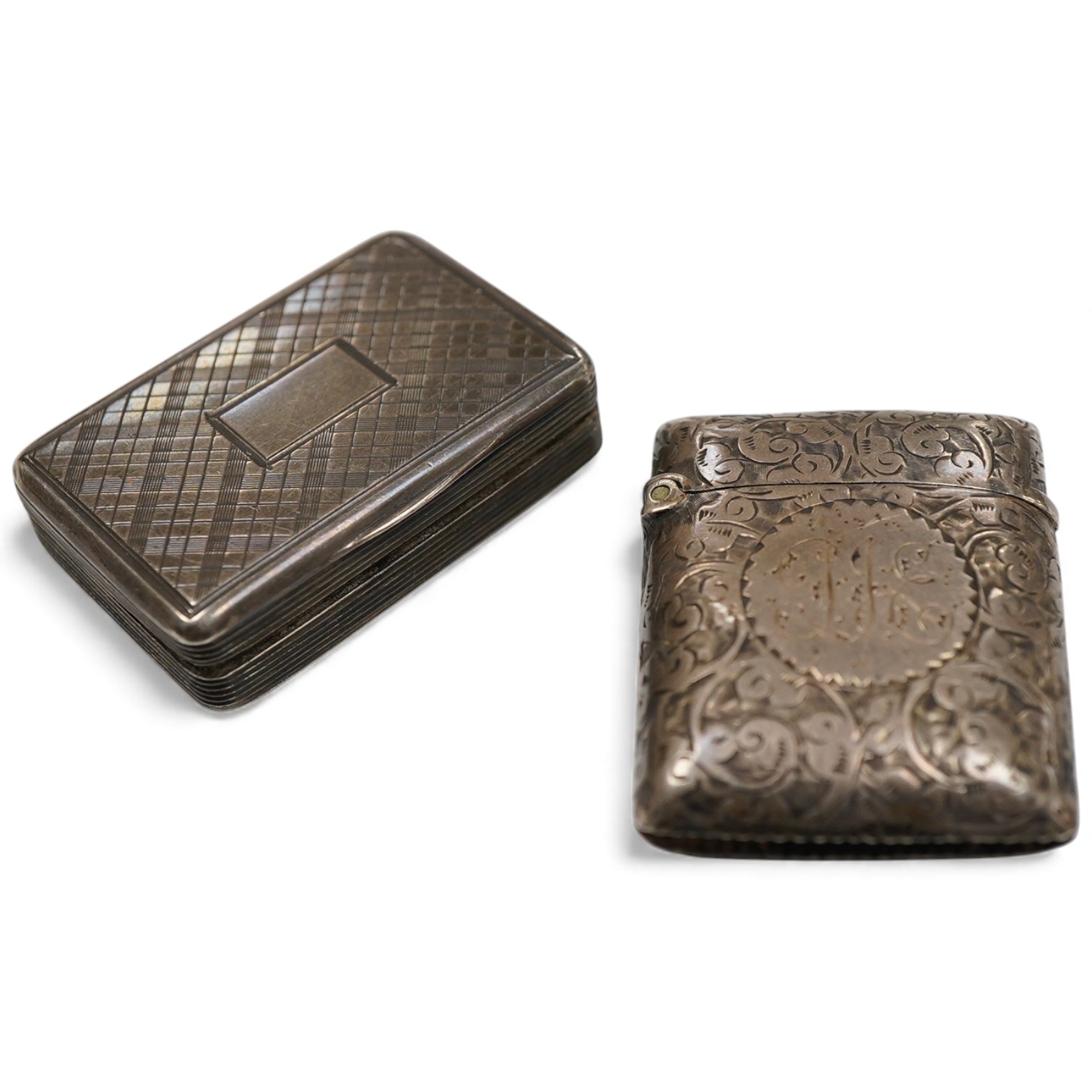 An early Victorian silver rectangular vinaigrette, with engraved chequered decoration, by William Simpson. Birmingham, 1836, 39mm, together with a late Victorian silver vesta case.